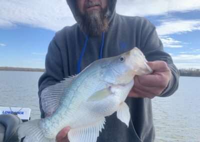 holding fish with both hands